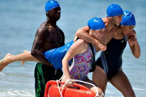 The yoke three-person rescue was one of four demanding events in Sunday’s ocean lifeguard test at Indian Wells Beach in Amagansett.