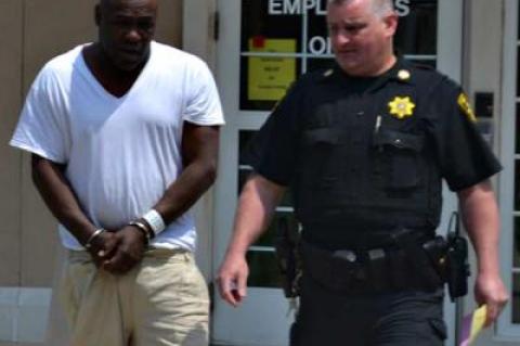 Bronte O’Neal, center, was arraigned in Riverside Wednesday on felony charges in the alleged assault of an 83-year-old Northwest Woods woman and stealing her car on May 30.