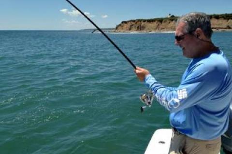 Light-weight rods have been bowing deeply to the big blues off Montauk Point, as Lou Rosado demonstrated aboard Capt. Ken Rafferty’s boat this week.