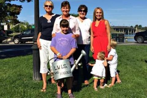 Members of the Sag Harbor Ladies Village Improvement Society — Gail Brown, Bethany Deyermond, Diane Lewis, and Amity Lucas, with her two kids, Hudson and Lana, and Sophia Deyermond in front — gathered on Long Wharf.