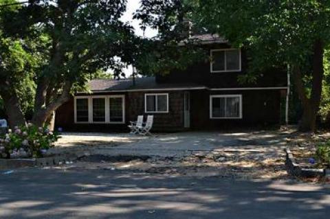 The owner of the house at 49 Gannet Drive in Montauk was arraigned Monday in East Hampton Town Justice Court on 27 charges of violating the town code. Among other things, she is accused of creating several bedrooms in the house from non-living spaces, including a closet.