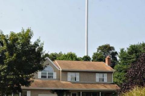 Tower looms over homes to the North East of Springs Firehouse.