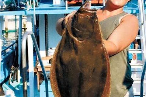 Annalee Ficorilli caught this eight-pound fluke a week ago while fishing on the Lazy Bones out of Montauk.