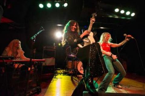 Lez Zeppelin, founded by Steph Paynes, center, delivers a high-energy set of Led Zeppelin’s music.