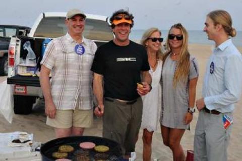 Democratic and Independence Party candidates for East Hampton Town trustee — Zachary Cohen, Rick Drew, and Tyler Armstrong — grilled up hamburgers and veggie burgers with help from Susan and Carly Drew during a beach party at Atlantic Avenue in Amagansett Sunday.