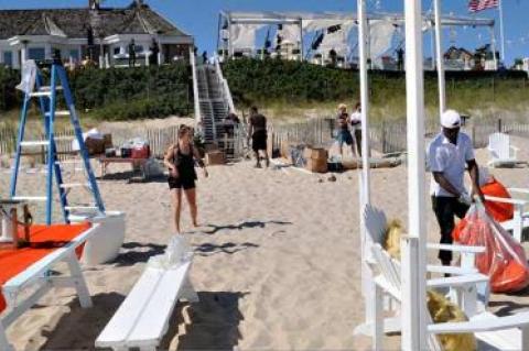 The East Hampton Village Board discussed expanding the user groups that would be required to secure a permit for large assemblies on public property, like this elaborate event held near Main Beach on Saturday.