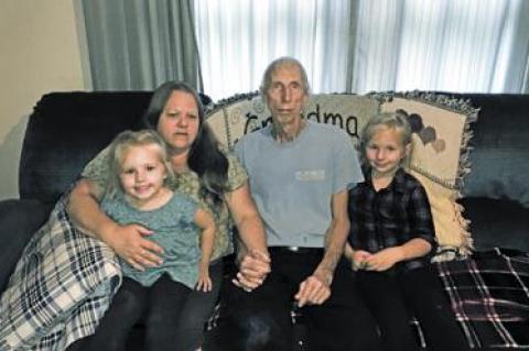 Lester (Zeke) Forbell, seen here last week with his wife Marianne Forbell, and their grandchildren Emma, left, and Jaiden, right, is out of work while he undergoes treatment for Stage 4 Pancreatic cancer.