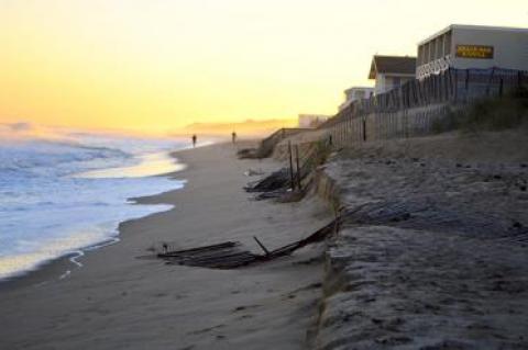 Earlier this week people walked along a narrow strip of dry sand on the downtown Montauk beach, where the Army Corps of Engineers is set to commence construction of a sandbag-filled artificial dune.