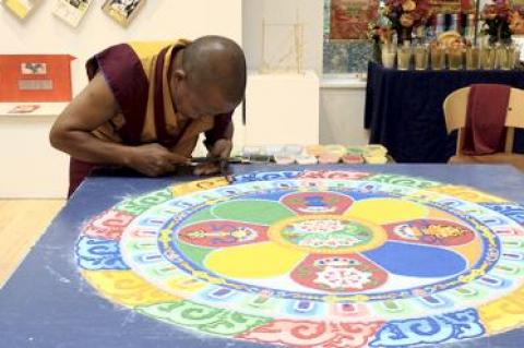 Tenizn Yignyen, a Tibetan Buddhist monk, constructed a sand mandala to teach students at the Ross School the importance of compassion and a good heart.