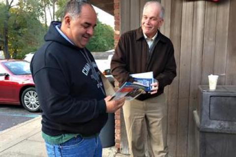 Tom Knobel, right, the Republican candidate for East Hampton Town supervisor, spent Tuesday morning handing out his campaign literature.