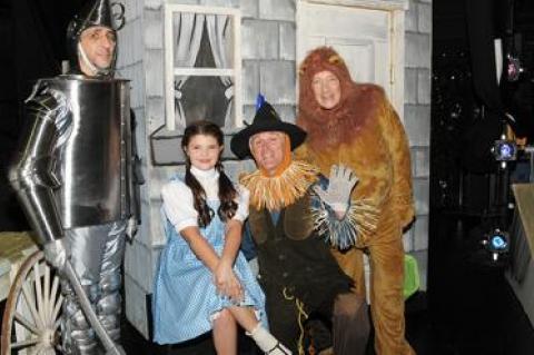 Richard Browning, Anna Schiavoni, James Zay, and Jack Crimmins enjoyed a break during rehearsals for “The Wizard of Oz.”