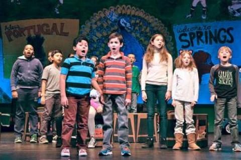 Yanddel Atariguana, front left, and Isaac Rodriguez, front right, star in “The Peacock’s Tale” as Joseph and Porfirio Goncalvez, two boys who immigrated from Portugal to Springs in 1962 and who became the inspiration for this year’s fourth-grade opera.