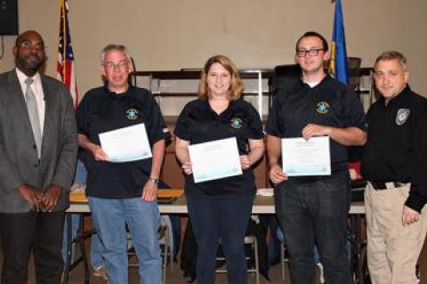 An ambulance crew from Sag Harbor were honored at a recent meeting of the Suffolk County Regional Emergency Medical Services Council. From left, Dr. Gregson Pigott, the E.M.S. medical director, with Joel Vetter, far right, helped honor the Sag Harbor volunteers, that included Eddie Downes, Denise Schoen, and Mike Stone.