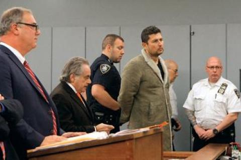 Sean P. Ludwick, fourth from left, was ordered held without bail on Tuesday.