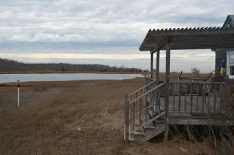 Neighbors of a Gerard Drive cottage have said that a planned house there would be the environmentally sensitive Springs peninsula’s “first McMansion.”