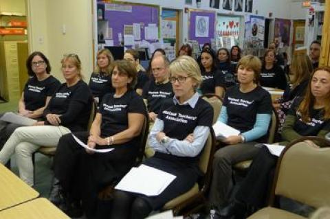 Teachers from the Montauk School wore black T-shirts to a school board meeting Tuesday to call attention to the fact that they’ve been working without a contract since July.