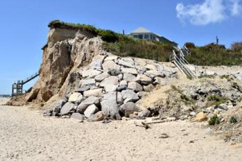 A Montauk oceanfront property owner hopes the town zoning board will allow him to improve a stone revetment intended to keep his house from falling into the Atlantic.