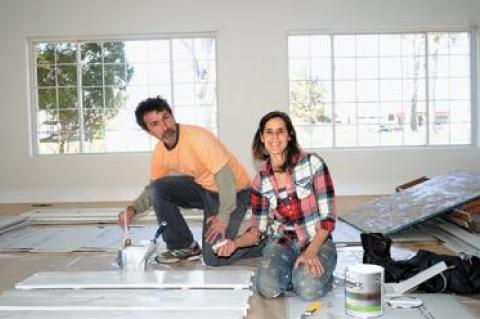 Jolie Parcher was at work on the former G.H. Bass & Co. shoe outlet space at Amagansett Square with help from Jaime Escalante in preparation for her yoga center’s move across the square this spring.