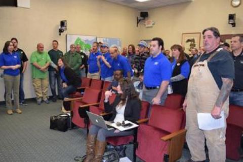 Members of the Southampton Civil Service Employees Association filled the Town Hall meeting room last week in support of a settlement agreement reached with Supervisor Jay Schneiderman, despite objections from other members of the board and the town highway superintendent.