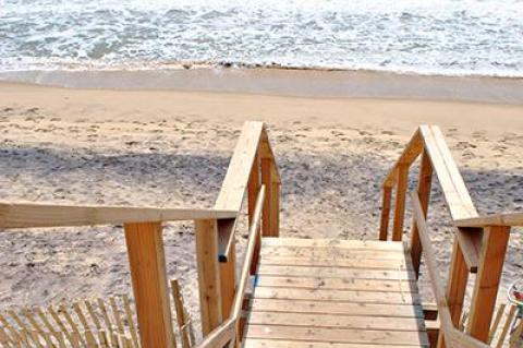 Stairways that have replaced sand paths to the downtown Montauk beach could cause difficulty not only to the disabled but to beachgoers laden with gear or carrying children, a Montauk hotel owner has said.