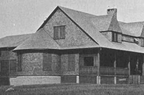 A cyanotype from 1885 shows the original Montauk Association clubhouse and an 1883 expansion on the back.