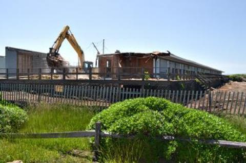 Protesters came out in force two years ago when the owners of the East Deck announced plans for a private beach club with its own restaurant and below-grade parking on the property. Now it’s being demolished to make room for four house lots.