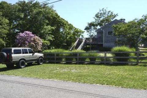 An owner of this Hoover Court house in Montauk is facing 44 code violation charges in East Hampton Town Justice Court in a potential jury trial that could be scheduled as soon as August.