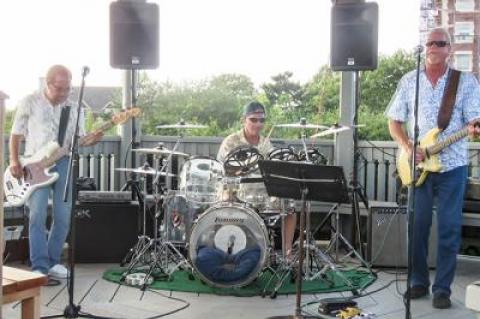 The 3Bs entertained a crowd at the downtown Montauk green on Monday night, while the Montauk Citizens Advisory Committee, meeting a short distance away, discussed the advantages and disadvantages of holding large events on the green.