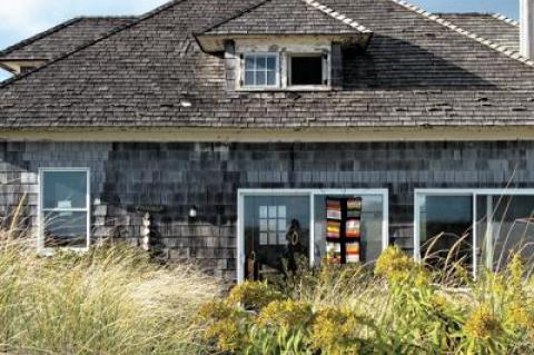 A modest cottage on the beach in Bridgehampton inspired two artists to respond to its likely razing, placing an installation of objects around its exterior.