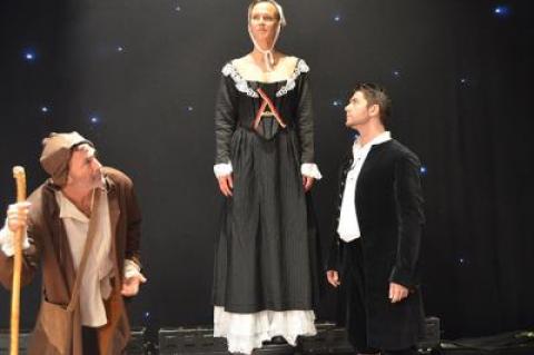 Nick Gregory, Chloe Dirksen, and Michael Raver in "The Scarlet Letter"