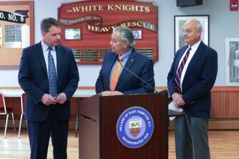 Chief Gerard Larsen of the East Hampton Village Police Department, left, who is retiring, was thanked for his service by Mayor Paul F. Rickenbach Jr. and Richard Lawler, the police commissioner and a member of the village board.