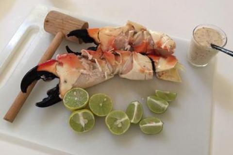 Stone crab claws start at $33 per pound in Key West and are classified as large, jumbo, and colossal. Below, Crustacean taxidermy was featured at the Key West Seafood Festival.