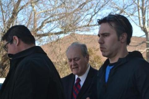 Robert Andrade, right, left East Hampton Town Justice Court last Thursday after he was arraigned on four misdemeanor charges related to an alleged under-age party house in Springs.