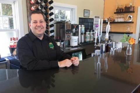 Jason Belkin, who owns Hampton Coffee Company with his wife, Theresa Belkin, was behind the bar at the Water Mill location and ready for the dinner rush on a recent Friday. The restaurant started serving dinner last month.