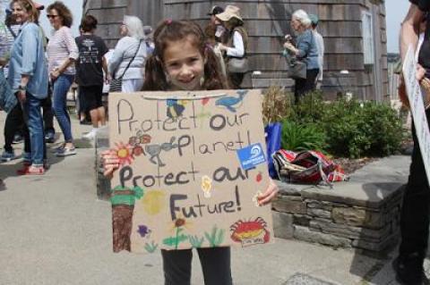 Kiana Dias was among the younger set of South Fork residents joining in a march and rally for action on climate change in Sag Harbor on Saturday.