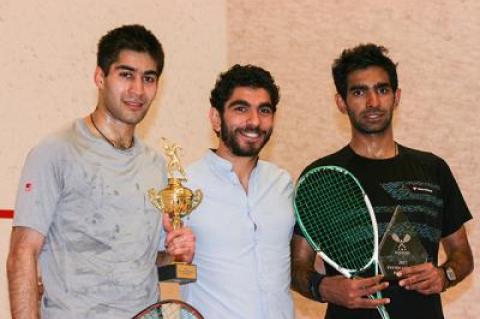 Mohamed Nabil, S.Y.S.’s resident squash pro, was flanked by the $5,000 pro tournament’s winner, Ramit Tandon, and the runner-up, Kush Kumar, following Sunday’s final.