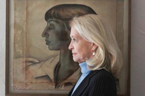 Ruth Appelhof stood next to a portrait of Lee Krasner at the Pollock-Krasner House and Study Center in Springs last month.