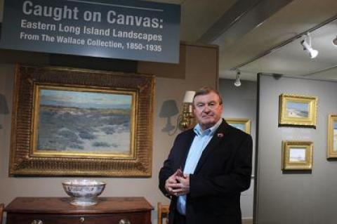 Terry Wallace greeted visitors at the opening reception on Friday for “Caught on Canvas: Views of Eastern Long Island Landscapes From the Wallace Collection, 1850-1935,” a show of a portion of his holdings through July 23 at the Clinton Academy.