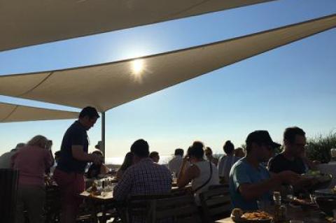 Getting seating on the deck at Duryea’s, now shaded with sailcloth, is near impossible when the place is busy. Fortunately, there are seating options indoors.