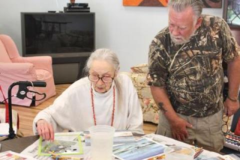 Jenna Rolf, 93, said she sees her surroundings differently since she started painting last year.