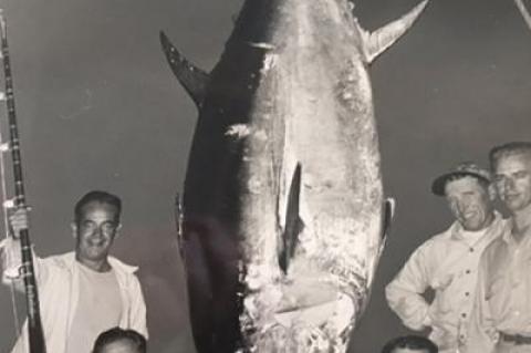 Capt. Frank Tuma Sr., kneeling at lower right, with a giant bluefin tuna caught aboard a charter fishing trip out of Montauk.