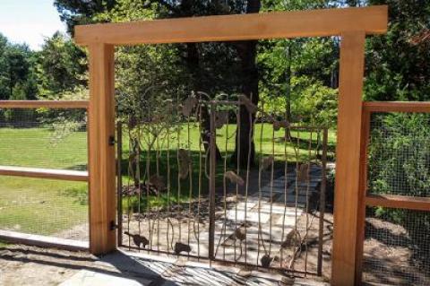 The metalsmith is proud of this intricate gate on East Hollow Road.