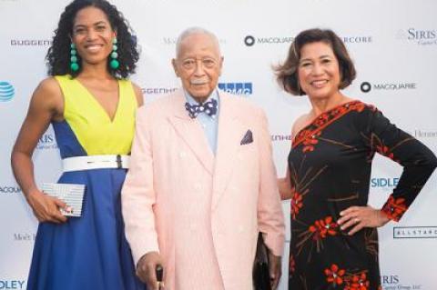 Christina Lewis Halpern, left, and her mother, Loida Lewis, right, will host a fund-raiser for All Star Code, which Ms. Halpern founded, on Saturday. They are pictured at last year’s event with David Dinkins, a former mayor of New York City.