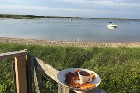 Where better to enjoy a plate of Thai corn cakes with sweet chili sauce than overlooking the water?