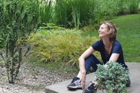 Toni Ross paused for a moment during the installation of her work at the LongHouse Reserve in East Hampton this spring to enjoy the atmosphere “and one of the happiest bird sanctuaries in the world,” she said.	Below, Jack Lenor Larsen and Toni Ross enjoyed a golf cart ride around the grounds of the LongHouse Reserve.