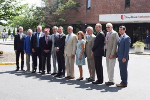 State officials were on hand for the unveiling of the new Stony Brook Southampton Hospital sign at the entrance to the hospital on Monday. The official merger took place on Aug. 1.