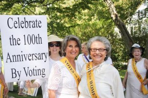 Arlene Hinkemeyer, right, of the League of Women Voters of the Hamptons was jubilant last Thursday at the league’s recreation of a 1913 women’s suffrage rally. With her was Brooke Kroeger.