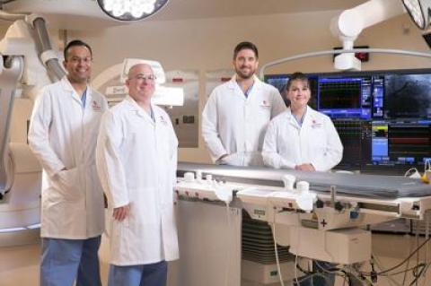 Dr. Dhaval Patel, a cardiologist, Gary Gerard, lead interventional/cardiac catheterization technologist, Dr. Travis Bench, interventional cardiologist and director of the cardiac catheterization lab at Stony Brook Southampton Hospital, and Helen VanDenessen, the nurse manager of imaging.