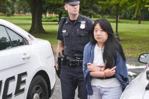 Kai Jing Liu was taken into custody by East Hampton Town police after they learned she is wanted by police in Snowmass Village, Colo., on a felony fraud warrant.