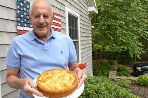 Among the four blue ribbons James Lubetkin brought home to Amagansett from the New York State Fair in Syracuse was one for his French apple Breton pie, a version of which he was holding.